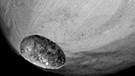 Ein Mikrometeorit, den Astronom Jon Larsen in Berlin gefunden hat. Mikrometeoriten sind kosmischer Staub aus dem Weltall. | Bild: Jon Larsen