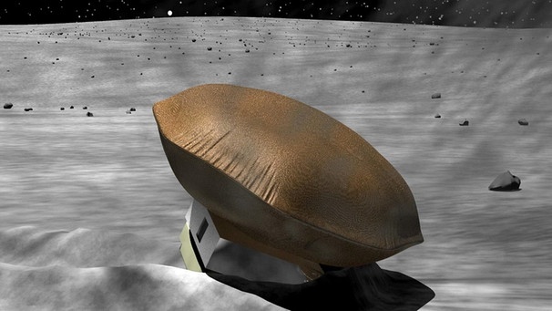 Eine Illustration der Oberflächensonde der japanischen Mondmission Omotenashi. Die Minisonde liegt auf der Mondoberfläche und ihr aufgeblasener Airbag für die Landung zeigt nach oben. | Bild: Jaxa