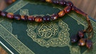 Gebetskette und Koran | Bild: picture-alliance/dpa/ANP