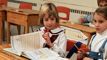Jungen und Mädchen im Unterricht | Bild: Getty Images