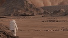 Fiktive Darstellung: Das künftige Leben auf dem Mars - auf lange Zeit nur mit Raumanzug und unter schützenden Dächern. | Bild: IMAGO / Cover-Images