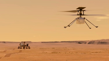 Die von der NASA zur Verfügung gestellte Illustration zeigt den «Ingenuity-Hubschrauber» (r) nach dem Start vom Nasa-Rover «Perseverance».   | Bild: dpa-Bildfunk