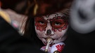 Am 1. November, dem Día de los Muertos, besuchen auch die Mariachis die prächtig geschmückten Gräber.  | Bild: picture-alliance/dpa