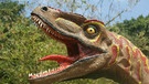 Kopf eines Dinosaurier-Modells mit langer Zunge | Bild: Spencer Wright