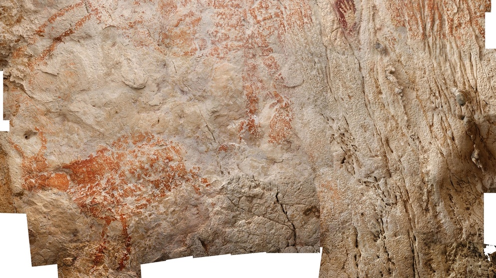 40.000 Jahre alte figürliche Darstellung auf Borneo. Prähistorische Zeichnungen an den Felswänden von Höhlen und Grotten zählen zu den ältesten Kunstwerken der Menschheit. Für Archäologie, Geschichte und Kunst sind Höhlenmalereien daher enorm wichtige Funde. | Bild: dpa-Bildfunk / Luc-Henri Fage