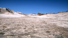 Eine Wüstenform durch Austritt des salzigen Grundwassers: das Valle de la Luna in Bolivien | Bild: picture-alliance/dpa
