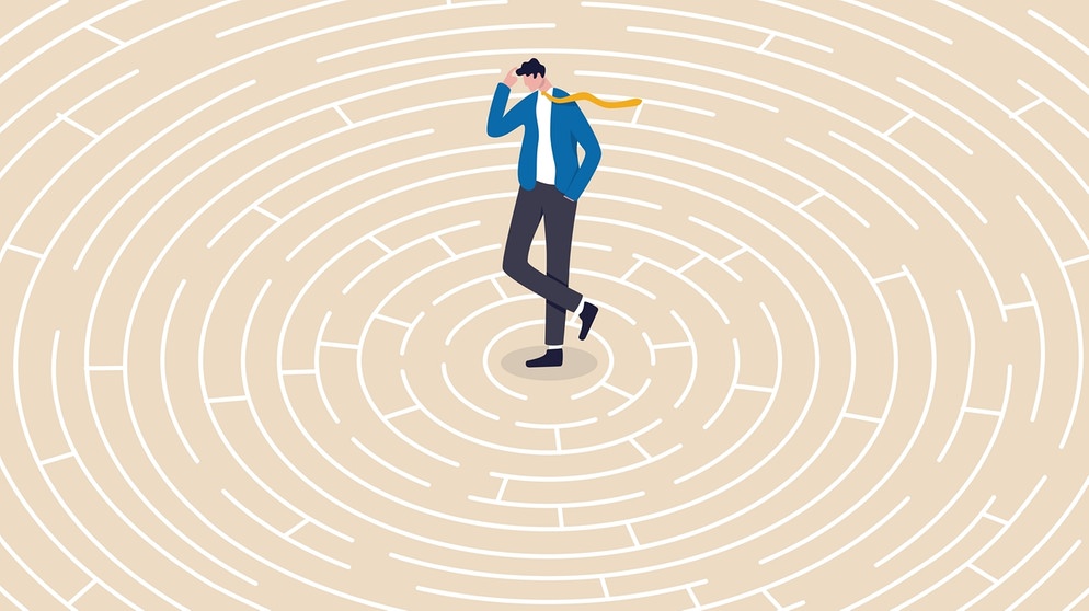 Illustration: Mann in einem Labyrinth. Grübeln wir, bewegen sich unsere Gedanken wie in einem Gedankenkarussell. Wir erklären euch die Ursachen für euren Grübelzwang und wie ihr negative Gedanken stoppen könnt. | Bild: colourbox.com