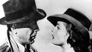 Berühmter Filmkuss 1942: Humphrey Bogart und Ingrid Bergman in "Casablanca". Es gibt Filme, an die wir uns vor allem wegen eines spektakulären Kusses erinnern. Wir zeigen euch die kultigsten Hollywood-Küsse und schönsten Liebesszenen.  | Bild: picture-alliance/dpa