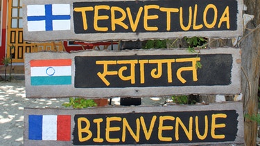 "Willkommen"-Schilder in unterschiedlicher Sprachen | Bild: colourbox.com