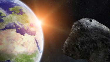 Künstlerische Darstellung: Asteroid fliegt an Erde vorbei. Tausende Asteroiden kreisen um die Sonne - und hin und wieder kommt einer auch in die Nähe der Erde. | Bild: NASA, dpa-Bildfunk
