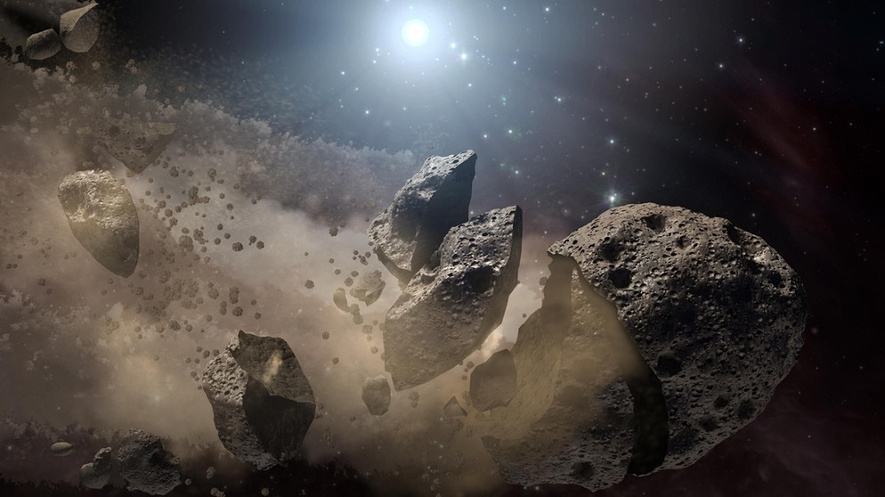 Asteroid zerbricht (Illustration). Durch Zusammenstöße kommt es immer wieder vor, dass Asteroiden zerbrechen. Die Bruchstücke - Meteoroide - können zu gefährlichen Geschossen werden, da ihre Flugbahn nicht mehr kalkulierbar ist. Erdnahe Asteroiden werden von Astronomen engmaschig überwacht, um einen Asteroideneinschlag auf der Erde möglichst zu verhindern. | Bild: NASA/JPL Caltech