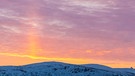 Lichtsäulen bei Sonnenaufgang in Tronsö | Bild: picture-alliance/dpa