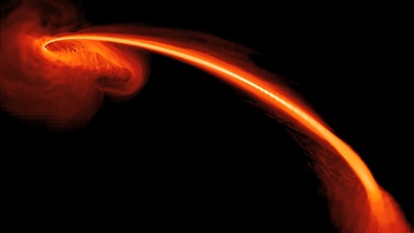 Computersimulation eines zerrissenen Sterns, der in ein Schwarzes Loch gesogen wird. | Bild: picture-alliance/dpa