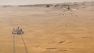 Illustration des fliegenden NASA Ingenuity Mars-Helikopters, während der Mars-Rover Perseverance sich am Boden entfernt.  | Bild: NASA/Jpl-Caltech