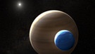 Künstlerische Darstellung eines Mondes um einen Planeten in einem anderen Sonnensystem: Ein Exomond von der Größe unseres Planeten Neptun könnte um den Exoplaneten Kepler 1625b kreisen, der etwa so groß ist wie Jupiter. | Bild: ESA,NASA