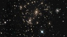 Galaxiehaufen, aufgenommen vom Weltraumteleskop Hubble | Bild: NASA, ESA, A. Koekemoer (STScI), M. Jauzac (Durham University), C. Steinhardt (Niels Bohr Institute), and the BUFFALO team