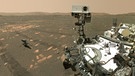 Dieses Selfie mit dem Mars-Hubschrauber Ingenuity im Hintergrund machte der NASA-Rover Perseverance am 6. April 2021, nachdem er Ingenuity für seinen Erstflug über den Mars platziert hatte. Dazu nutzte Perseverance eine Kamera am Ende seines Roboterarms. | Bild: NASA/JPL-Caltech/MSSS