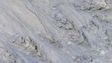 Mars-Oberfläche mit sandigen Rinnen. | Bild: NASA Jet Propulsion Laboratory/Caltech