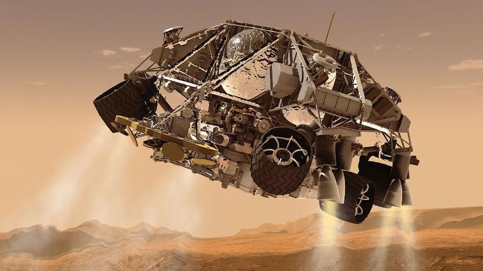 Illustration: Gegenschub aus Landungsdüsen verhindern einen Bodenkontakt. Curiosity, der Mars-Rover der NASA, soll sicher landen. | Bild: NASA