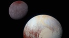Pluto (vorne) und Pluto-Mond Charon | Bild: NASA/JHUAPL/SwRI