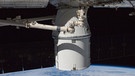 Die Dragon-Kapsel dockt im Oktober 2012 an das Harmony-Modul der Raumstation an. Elon Musks private Raumfahrtfirma SpaceX hat das Raumschiff Dragon entwickelt. Es übernimmt als Ersatz für die Space Shuttles der NASA die Transportflüge zur Internationalen Raumstation. | Bild: NASA