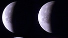 verschiedene Phasen der Mondfinsternis im Jahr 2000 über Hamburg | Bild: picture-alliance/dpa